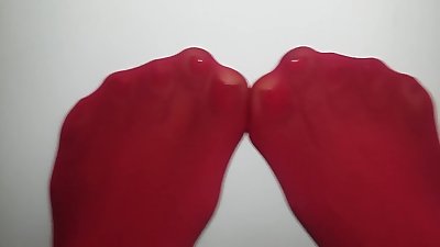 rojo los dedos de los pies en rojo manguera