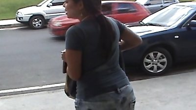 Big ass latin girl walking on the street