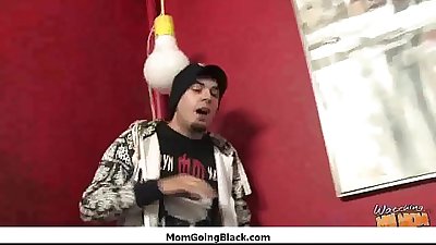 White MILF rides black cock 21
