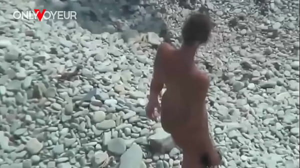 Beach Voyeur. Hot babe the beach totally naked and with buttplug in her ass